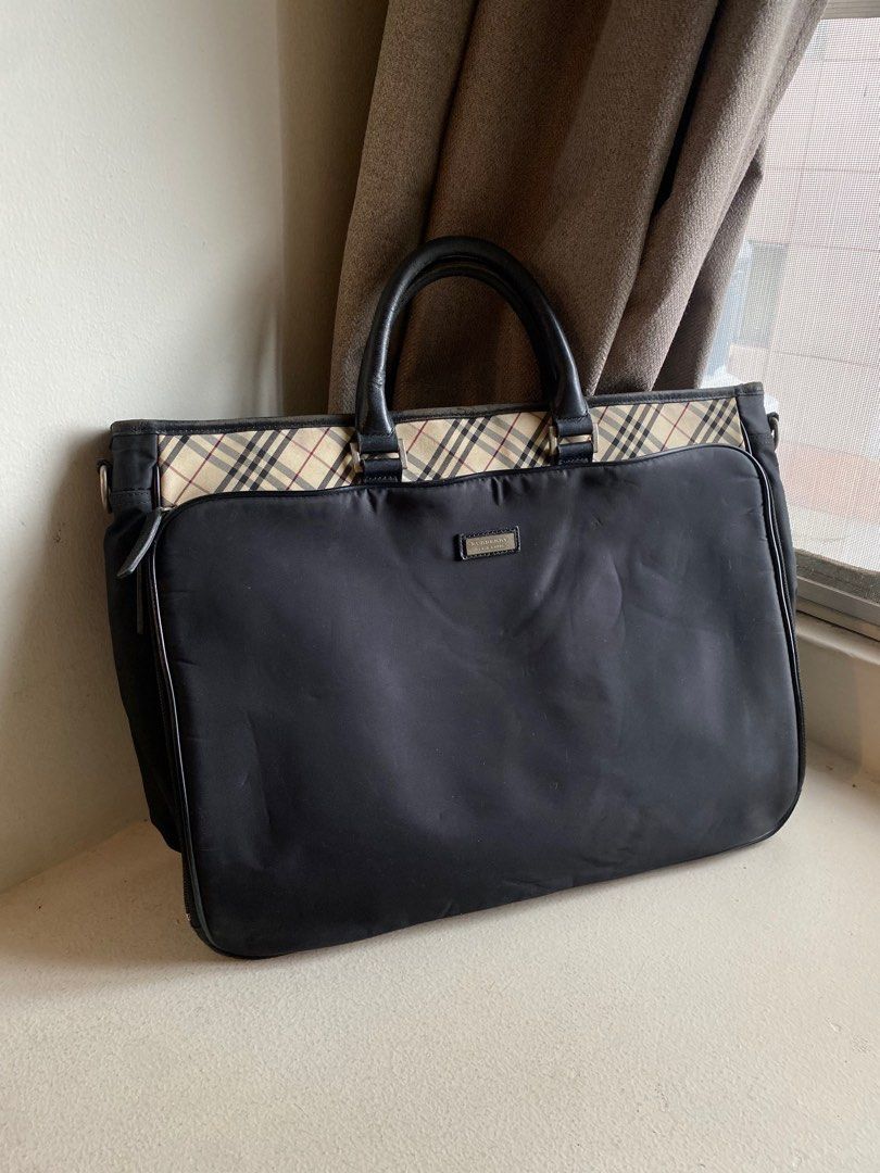Authentic Burberry Black Label Office Laptop Bag (Category: Luxury Bags & Wallets) located in Mandaluyong City. Submitted by wear_your_style (Listing ID 1408545122, Image 1). Description: Bought in Japan, I think sa Bookoff, thus the Black Label. Semi-structured bag na maraming compartments so marami ka malagay. May zipped compartment sa front puwede mo lagyan pens, etc; main zipped compartment, very roomy, kasya laptop, then may zipped secret po