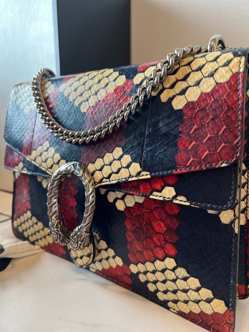 Authentic Gucci Medium Dionysus Python (Category: Bags & Wallets) located in Kuala Lumpur. Submitted by christ79 (Listing ID 1408556962, Image 2). Description: Width : 12 inch Height : 8 inch Depth : 4 Inch Condition : Very Good Condition Comity with box , Dust bag and authentic card label.( as per photo) This is handcrafted in Python skin.(RARE) Only meet up or by Lalamove ( fees by buyer).