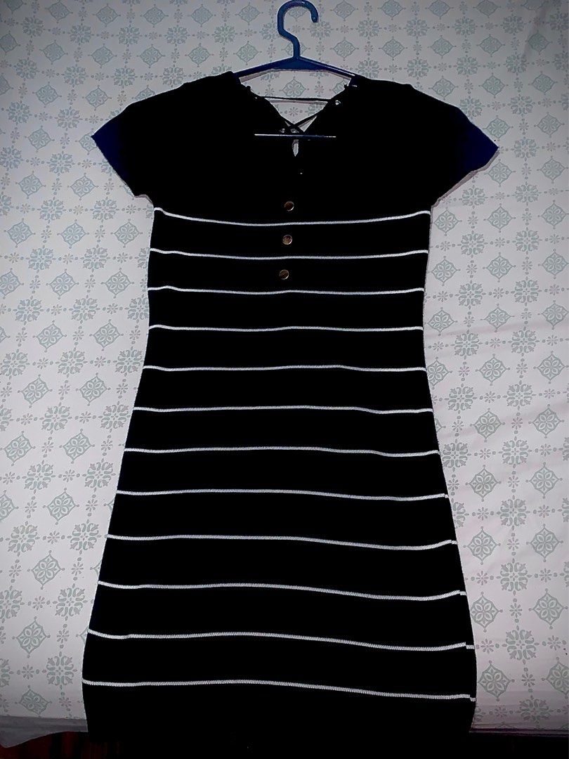 Black and White Striped Dress (Category: Dresses) located in Manila. Submitted by leiluh (Listing ID 1408597792, Image 1). Description: - Classic black and white striped design - Flattering bodycon fit - Stylish v-neckline - Short sleeves - Lace-up back detail - Button detail on the front - Perfect for casual wear xs-m mod: jnt/lalamove mop: bpi/insta pay QR meetups: within vito cruz/españa/sampaloc/mnl area only +willing to nego : ).