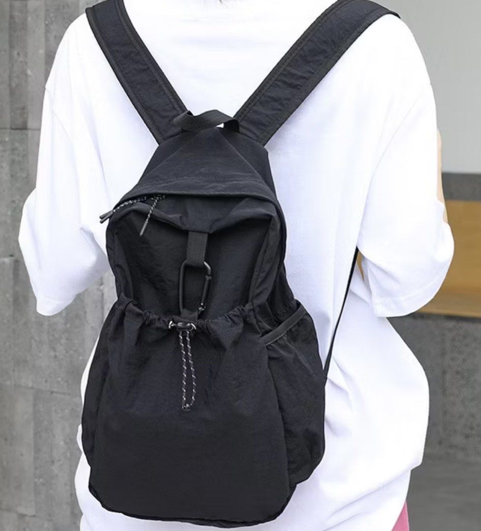 Black Drawstring Backpack (Category: Backpacks) located in Singapore. Submitted by xinyiii22 (Listing ID 1408658317, Image 2). Description: ❗️Product Details: - Stylish black backpack - Drawstring closure - Carabiner clip - Adjustable straps ❗️Note: - DM for more details - DM for meet up location - DM for nego - Strictly Paynow/Cash .