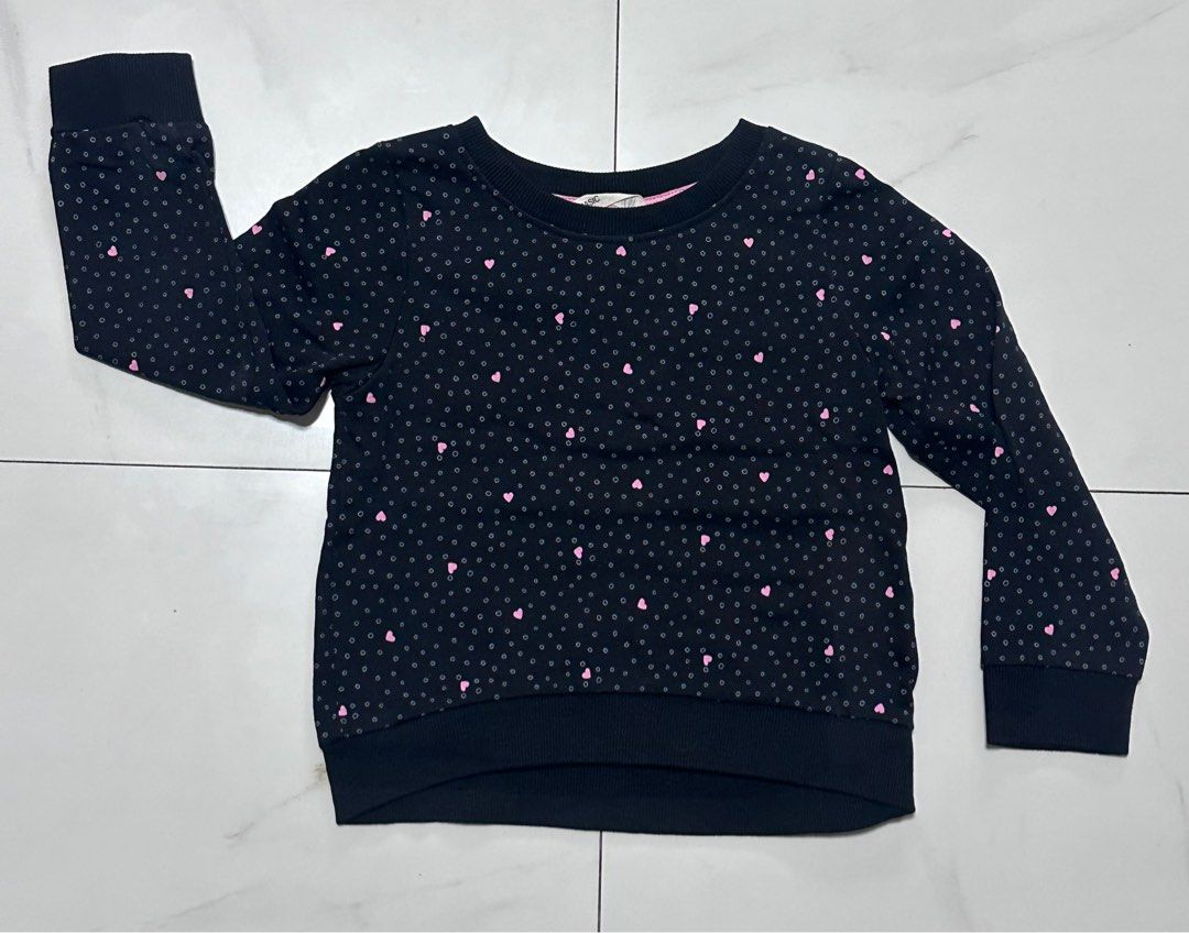 H&M Black Heart Print Sweatshirt (Category: Babies & Kids Fashion) located in Manila. Submitted by chamwel (Listing ID 1408528235, Image 1). Description: - Black sweatshirt - Heart print - Crew neck - Long sleeves - Ribbed cuffs and hem - Soft, comfortable fabric - Ideal for everyday wear -see photo for reference.