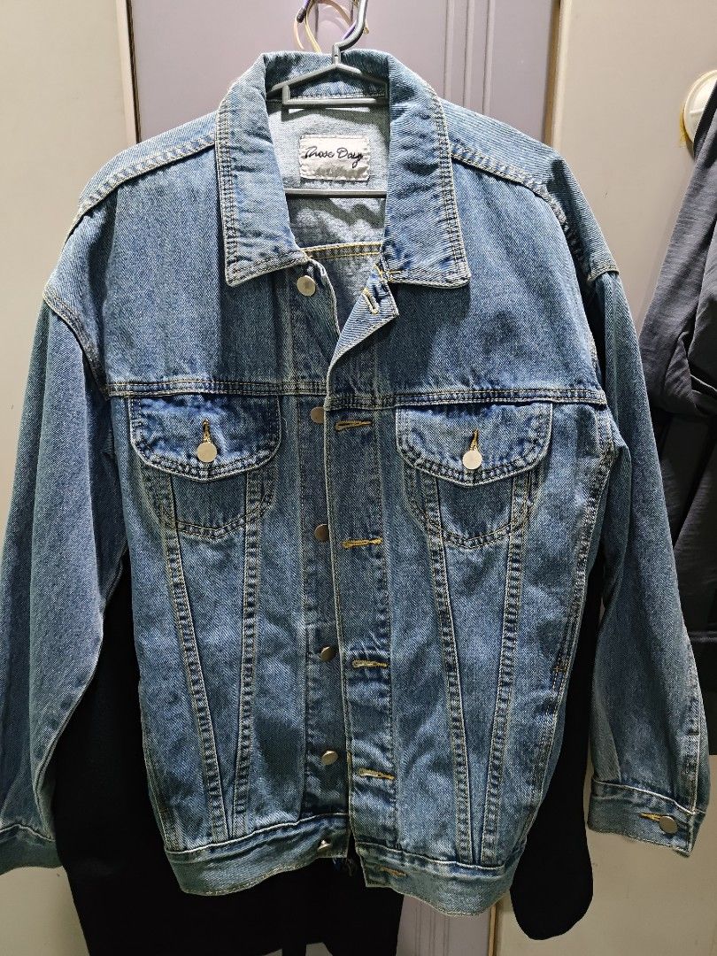 Denim Jacket (Category: Coats, Jackets and Outerwear) located in Kuala Lumpur. Submitted by yth08 (Listing ID 1408502713, Image 1). Description: - Light blue denim wash - Button closure - Two chest pockets - Collared neckline - Long sleeves - Standard fit - Vertical seam detailing on the back.