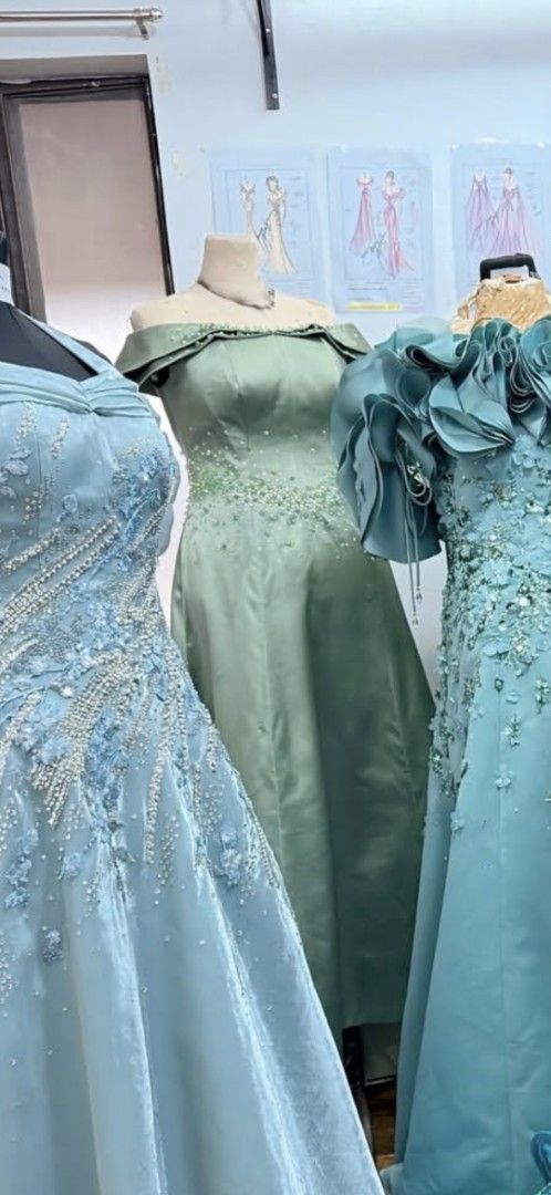 Elegant Sage Green Gown (Category: Evening dresses & gowns) located in Navotas City. Submitted by declutteringwithkc (Listing ID 1408629907, Image 2). Description: - Sage green off-shoulder gown: - Delicate beadwork on bodice - Flowing skirt - Ideal for formal events Rfs. Decluttering .