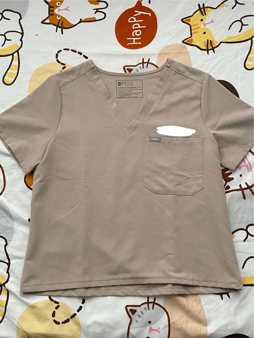 FIGS (Category: Sets or Coordinates) located in Quezon City. Submitted by dan.bam (Listing ID 1408627730, Image 3). Description: - FIGS V-neck scrubs - Available colors: teal, gray, and beige - Features a chest pocket - Made from comfortable and durable fabric - Ideal for medical professionals and comfortable workwear TOP IS ALTERED SHORTENED LENGTH.