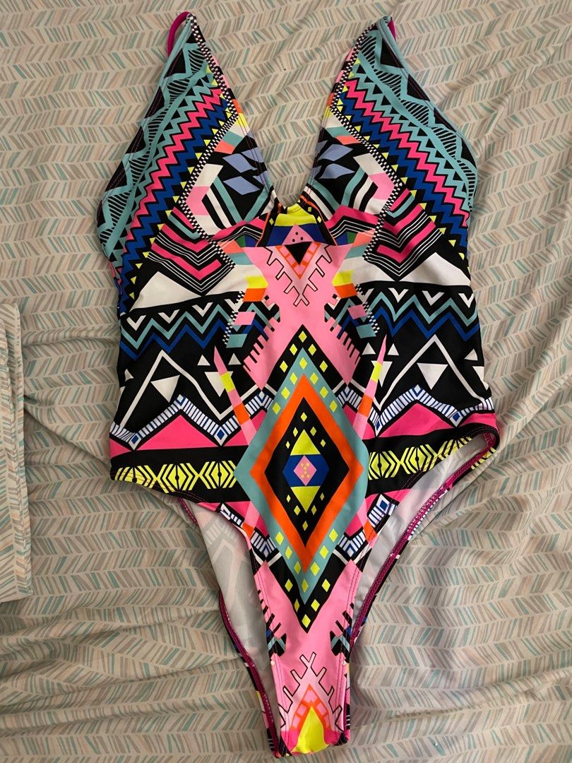 Floral Print One-Piece Swimsuit (Category: Bikinis & Swimsuits) located in Quezon City. Submitted by samflowers (Listing ID 1408541972, Image 2). Description: Selling barely used swimsuits! One piece not bagay sakin hehe :) .