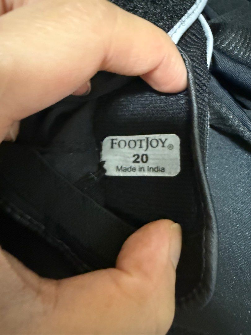 FootJoy Golf Gloves Size 20 (Category: Golf) located in Makati City. Submitted by decluttering_28 (Listing ID 1408515402, Image 3). Description: - FootJoy golf gloves - Size: 20 - Color: Black with white accents - Made in India - Material: Leather and mesh - Features the FootJoy logo.