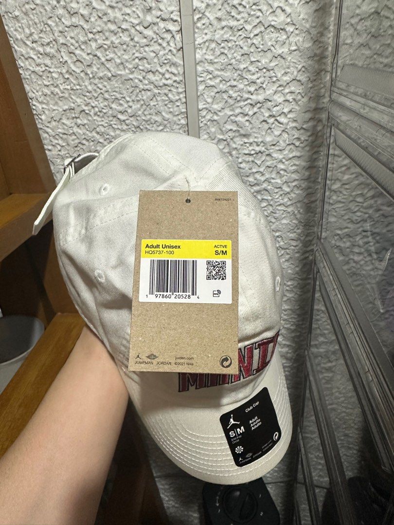 Jordan Manila Club Cap (Category: Caps & Hats) located in Mandaluyong City. Submitted by lmrp3 (Listing ID 1408582328, Image 3). Description: - Jordan Club Cap - Features "MANILA" embroidery - Color: White cap with red embroidery - Size: Adult S/M - Design: Curved brim, adjustable strap - Jordan logo on the side Brand new with tag.