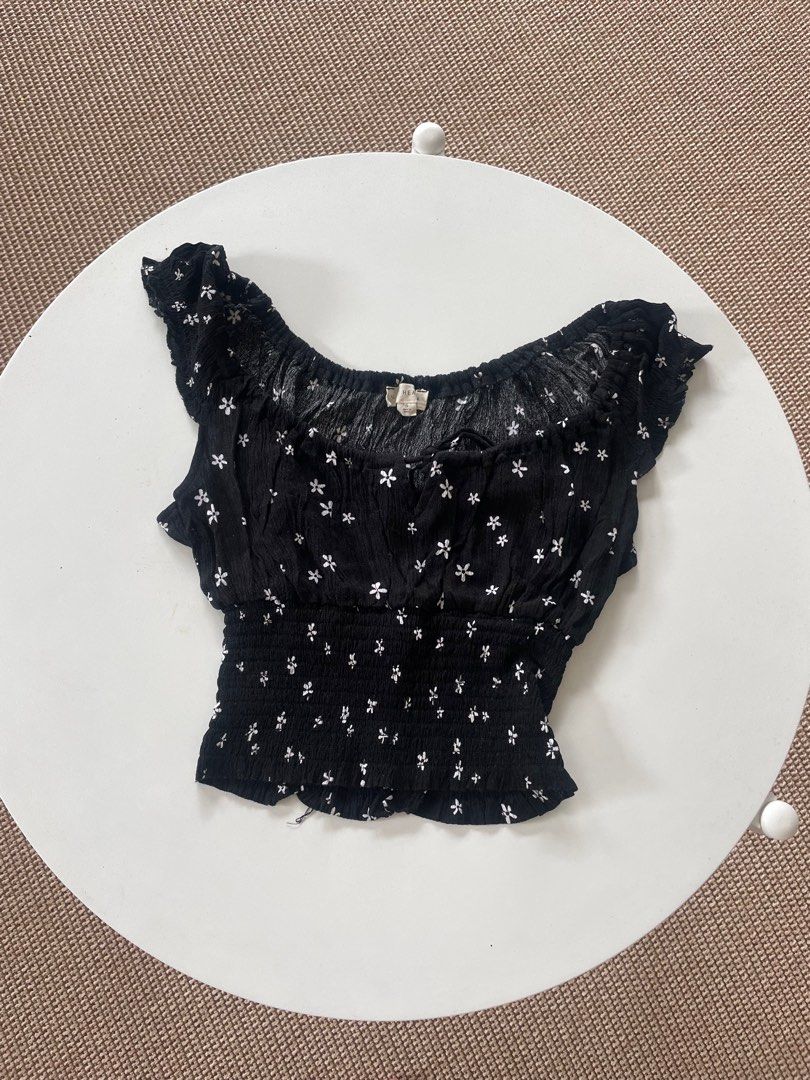L.A. Hearts Floral Top - Size S (Category: Blouses) located in Muntinlupa City. Submitted by henlo03 (Listing ID 1408541881, Image 1). Description: - L.A. Hearts black floral top - Size: Small - Design: Off-the-shoulder - Features: Smocked waist - Pattern: Small white flowers.