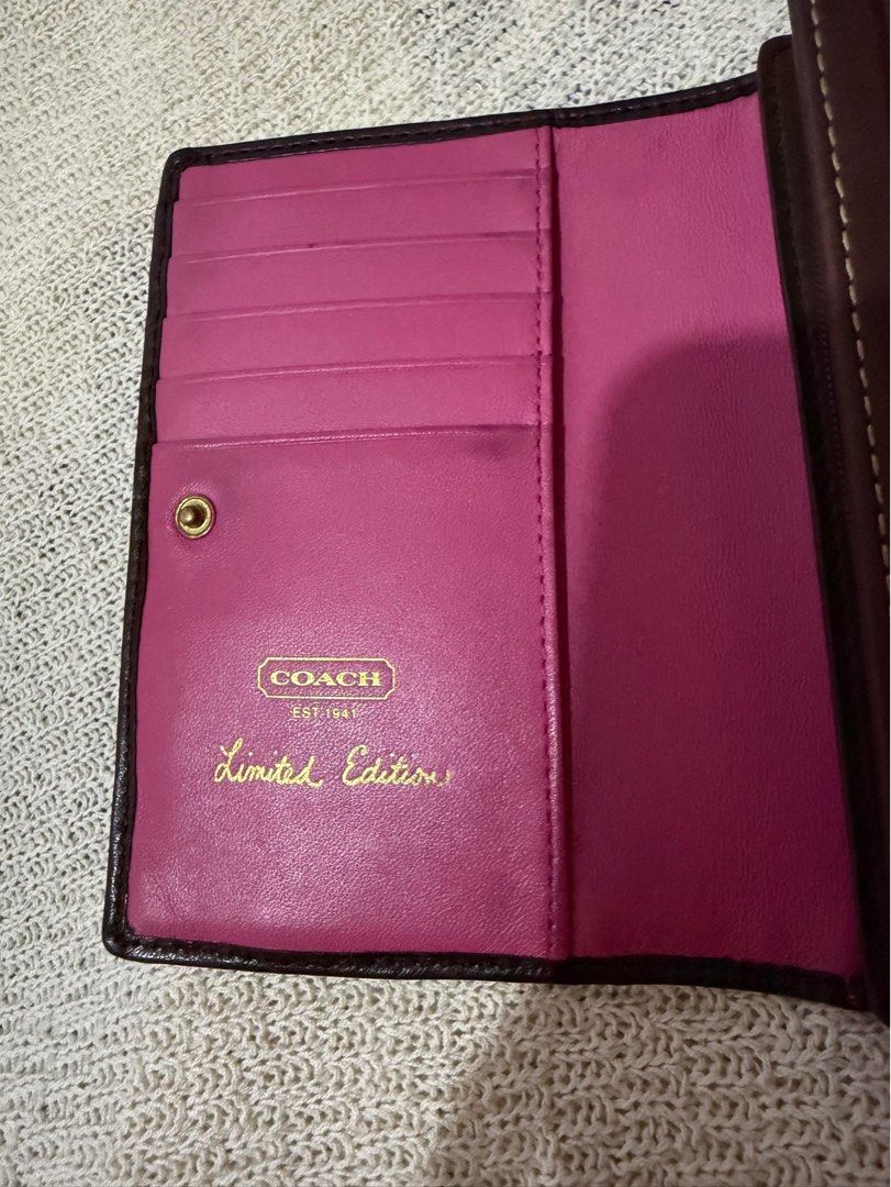 [SOLD] Limited Edition Vintage Coach Bifold Wallet Brown Pink (Category: Wallets & Card holders) located in Bulacan. Submitted by prelovedetc (Listing ID 1408590406, Image 2). Description: This is a limited-edition Coach bifold wallet features an attractive brown and pink combination. Model: Limited Edition Color: Brown/Pink Material: Canvas/Leather Dimension: 19cm wide and 9.5cm tall Interior Pocket: 10 Card Slots 1 external slip pocket 1 inner 