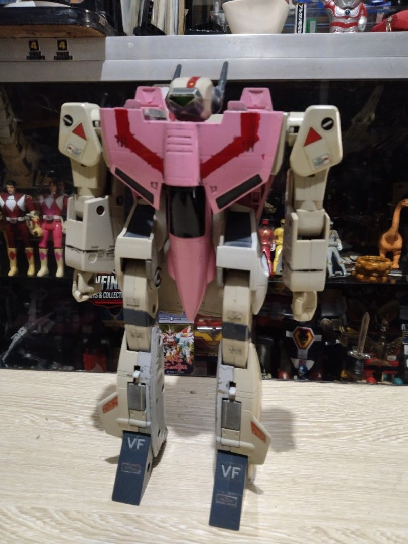 Macross Set (Category: Gundam & Model Kits) located in Manila. Submitted by megazordbuilderhunter (Listing ID 1408578833, Image 2). Description: Valkyrie Orguss Orgroid Moderoid Nikick set only pls see picture for the issue sell as is willing to assist to discuss the known issue of each item - Set of three Macross robot toys - Includes VF-1J, VF-1A, and VF-1S models - Each robot transforms into different modes - Features colors like gray, red, pi