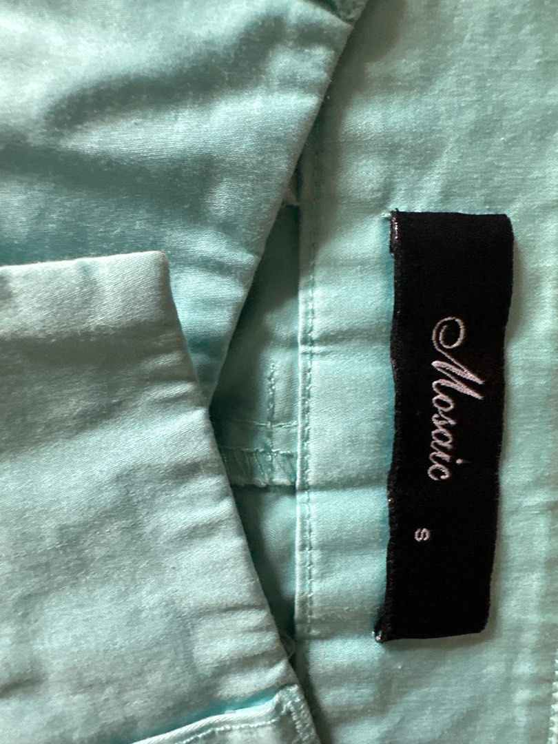 Mosaic Shorts - Size S (Category: Shorts) located in Quezon City. Submitted by struddels (Listing ID 1408547654, Image 2). Description: - Brand: Mosaic - Color: Light Blue/Aqua - Size: S - Design: Folded hem - Closure: Button and zipper - Material: Light fabric - Style: Classic and versatile - Suitable for warm weather.