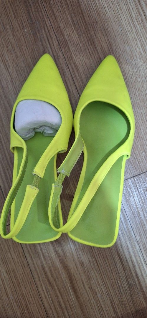 Neon Green Slingback Heels & Clutch (Category: Heels) located in Makati City. Submitted by r_lopez (Listing ID 1408571883, Image 1). Description: - Neon green slingback heels with pointed toes - Small heel and adjustable strap - Matching neon green clutch included - Clutch features zipper closure and wrist strap - Vibrant, eye-catching color - Used once during our 2025 Year-end Party.