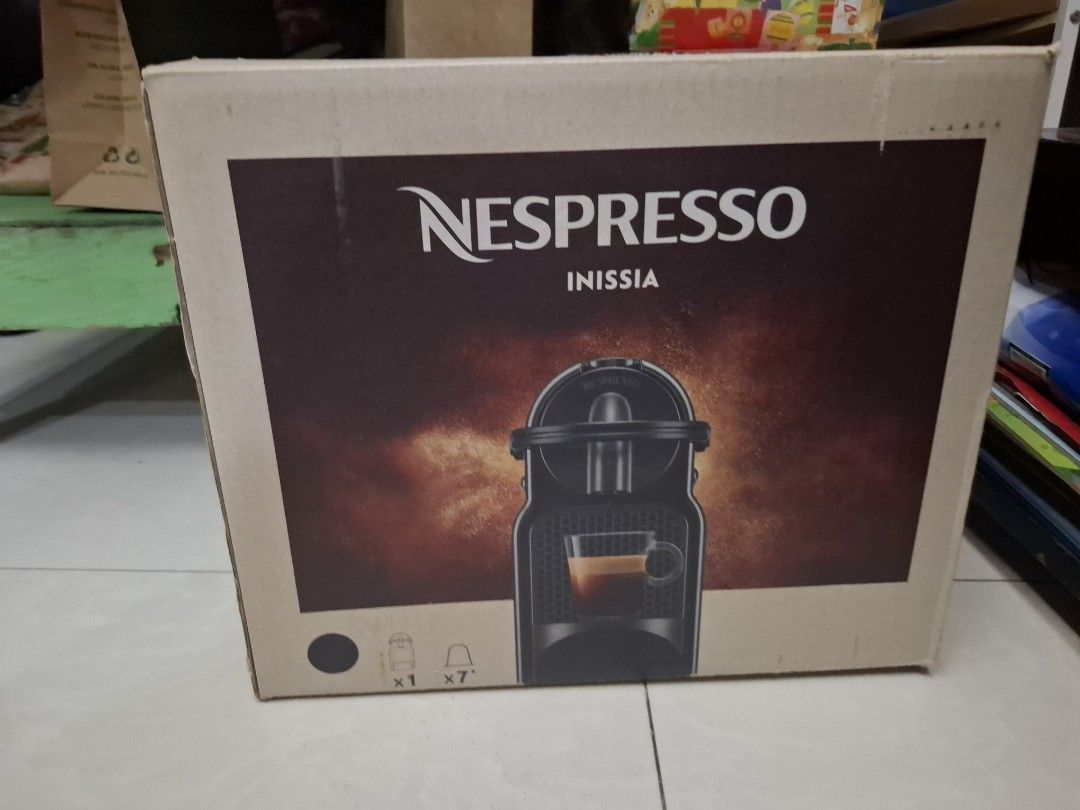 Nespresso Inissia Coffee Machine (Category: Coffee Machines & Makers) located in Quezon City. Submitted by crisnav (Listing ID 1408627417, Image 2). Description: - Nespresso Inissia coffee machine - Includes machine and accessories - Compact and space-saving design - Compatible with Nespresso capsules - Made in Ukraine rfs won from a raffle yes nanalo na naman po ako. haha yearly ang panalo ko. bilhin niyo na pleaseeeee. need money for pagkain ng