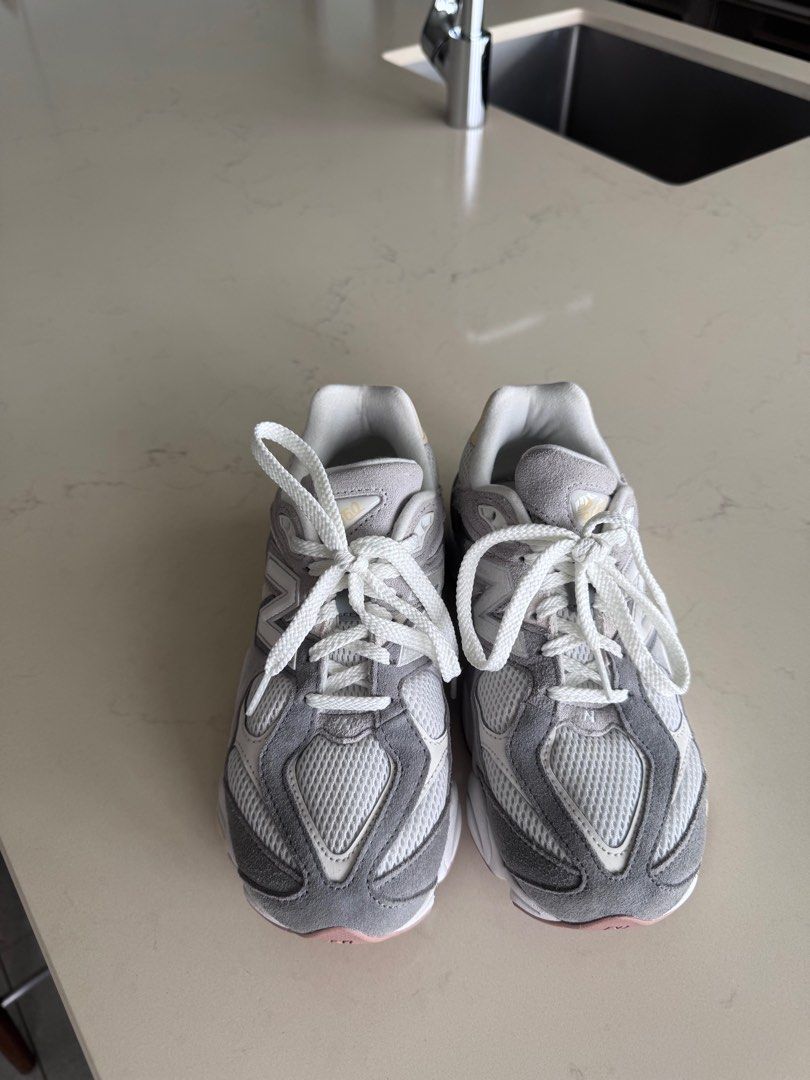 New Balance 9060 Grey ORIGINAL (Category: Sneakers) located in Makati City. Submitted by lexyu (Listing ID 1408575425, Image 2). Description: Boys size perfect for 23cm/Womens US 5 but will fit up to US 6 Bought original in Laz Mall Looks sooo good and is uso for a reason. Good for working out and for fits! RFS: Not using it as much, still using my old training shoes.