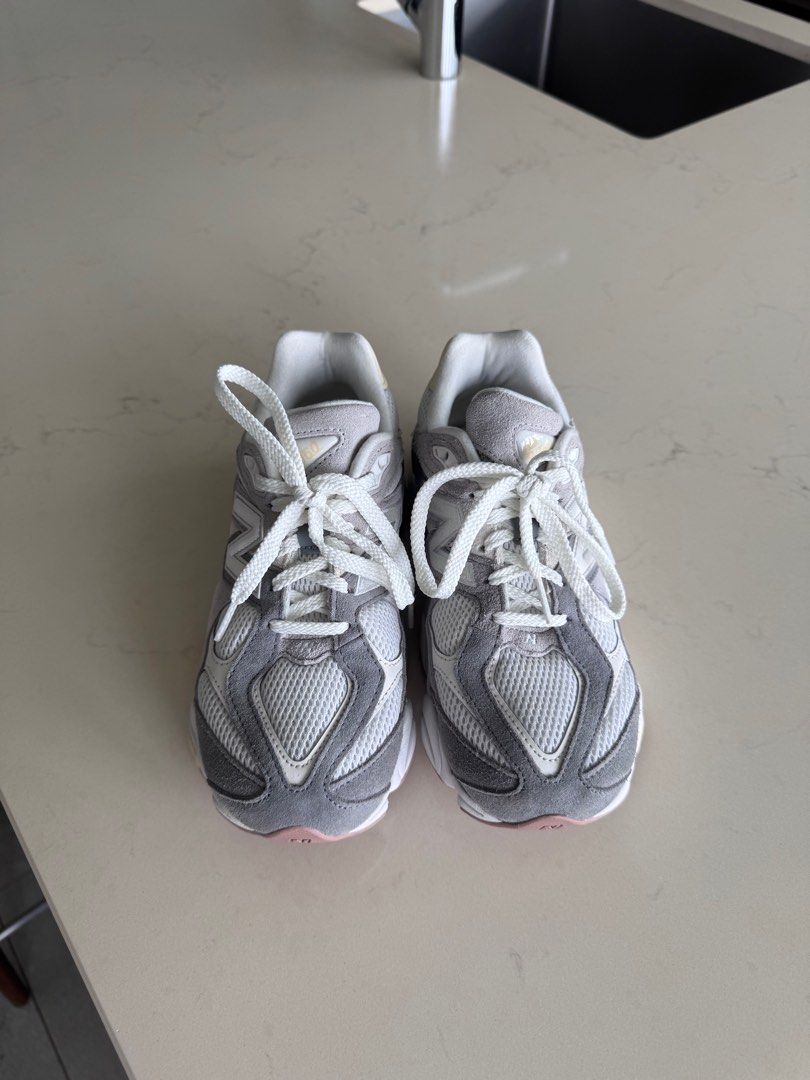New Balance 9060 Grey ORIGINAL (Category: Sneakers) located in Makati City. Submitted by lexyu (Listing ID 1408575425, Image 3). Description: Boys size perfect for 23cm/Womens US 5 but will fit up to US 6 Bought original in Laz Mall Looks sooo good and is uso for a reason. Good for working out and for fits! RFS: Not using it as much, still using my old training shoes.