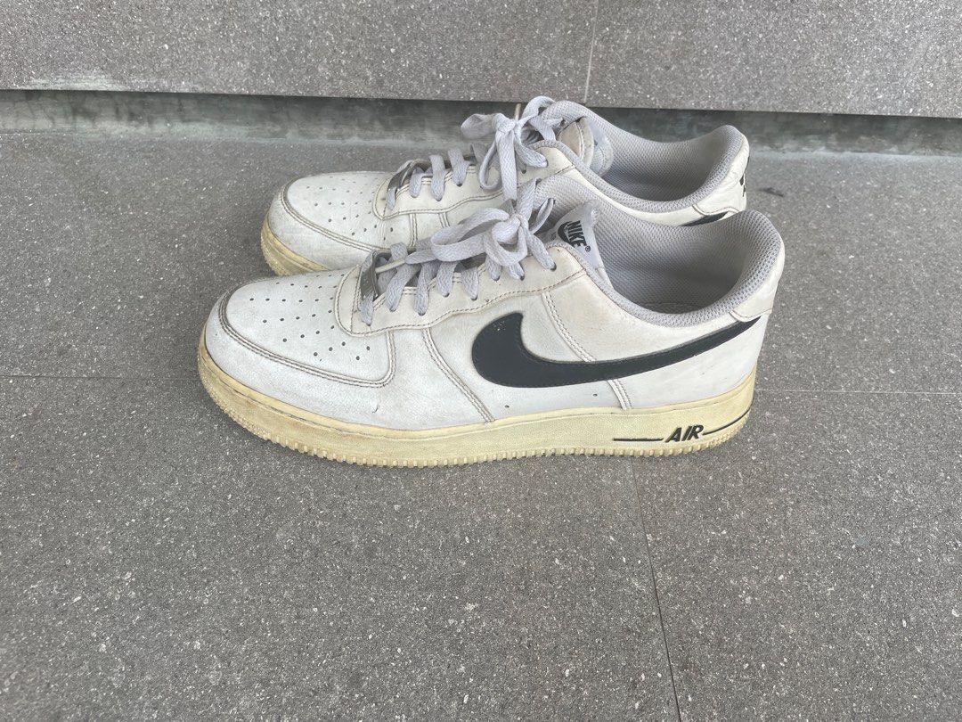 Nike Air Force 1 Low White (black swoosh) (Category: Sneakers) located in Quezon City. Submitted by xizoct (Listing ID 1408509735, Image 1). Description: authentic needs cleaning.
