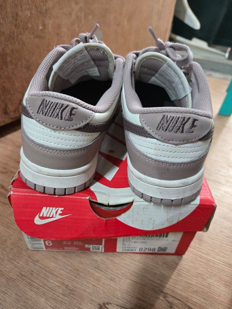 Nike Dunk Low Sail/Plum Eclipse (Category: Sneakers) located in Makati City. Submitted by abcd2020. (Listing ID 1408513374, Image 2). Description: - Nike Dunk Low - Colorway: Sail/Plum Eclipse - Size: UK 3.5 / EUR 36.5 / BR 35 - Includes original box pr ice still negotiable! :) - Made in Vietnam - Features Nike swoosh logo - White and brown color scheme.