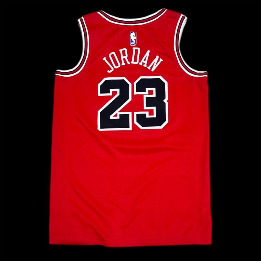 Nike Swingman Michael Jordan Chicago Bulls Jersey (Category: Activewear) located in Valenzuela. Submitted by gotdrip (Listing ID 1408628596, Image 2). Description: - Authentic Nike Michael Jordan Chicago Bulls jersey - Features iconic Bulls logo and number 23 - Includes NBA Swingman logo and NikeConnect technology - Size 40 - Classic red, white, and black color scheme - Ideal for basketball enthusiasts.