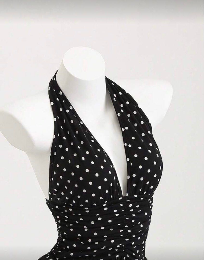 Polka Dot Halter Dress (Category: Dresses) located in Mexico. Submitted by beyondd (Listing ID 1408614129, Image 3). Description: - Halter neck design - Black base with white polka dots - Skirted bottom - Ruched waist detail - Used once for a halloween party only - Length for 5’3 is until around upper thighs .