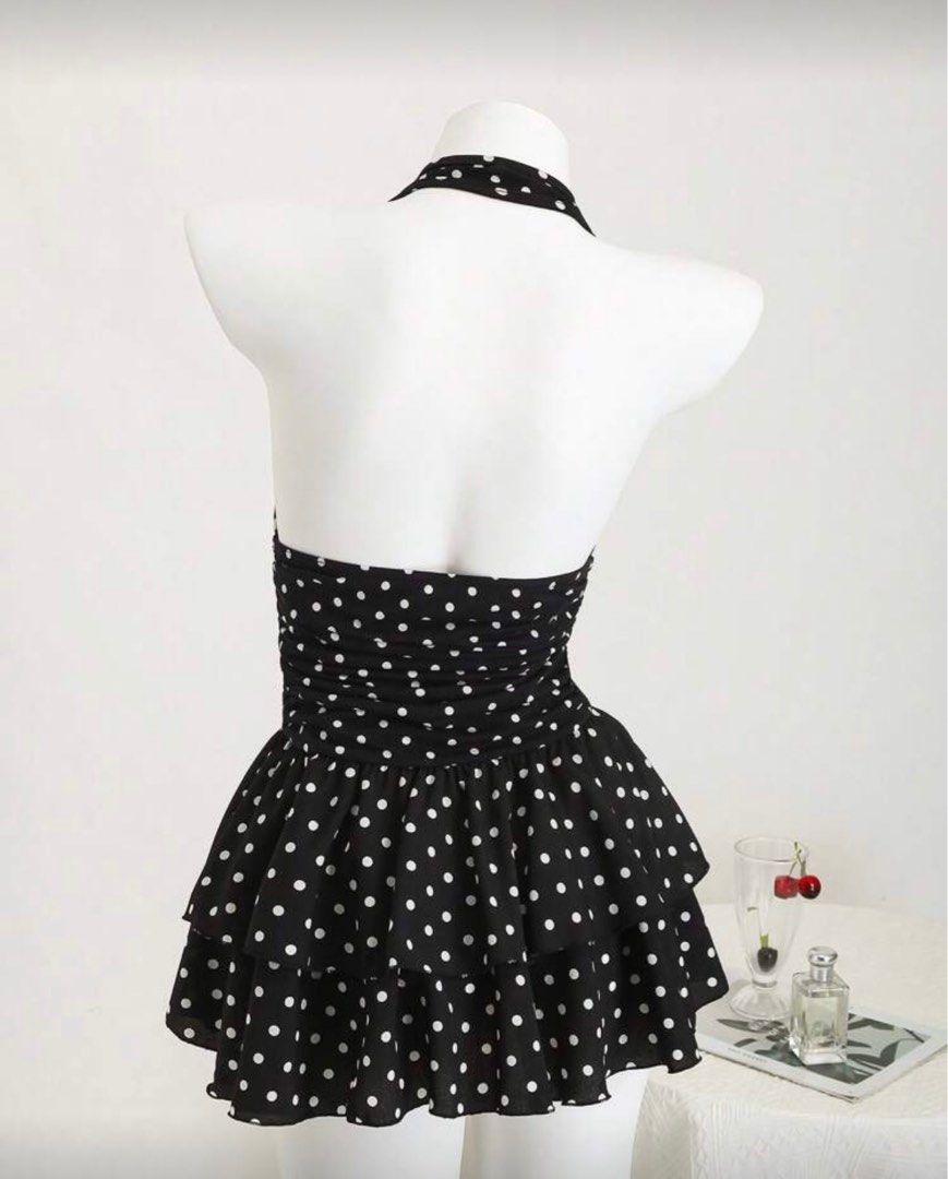 Polka Dot Halter Dress (Category: Dresses) located in Mexico. Submitted by beyondd (Listing ID 1408614129, Image 2). Description: - Halter neck design - Black base with white polka dots - Skirted bottom - Ruched waist detail - Used once for a halloween party only - Length for 5’3 is until around upper thighs .