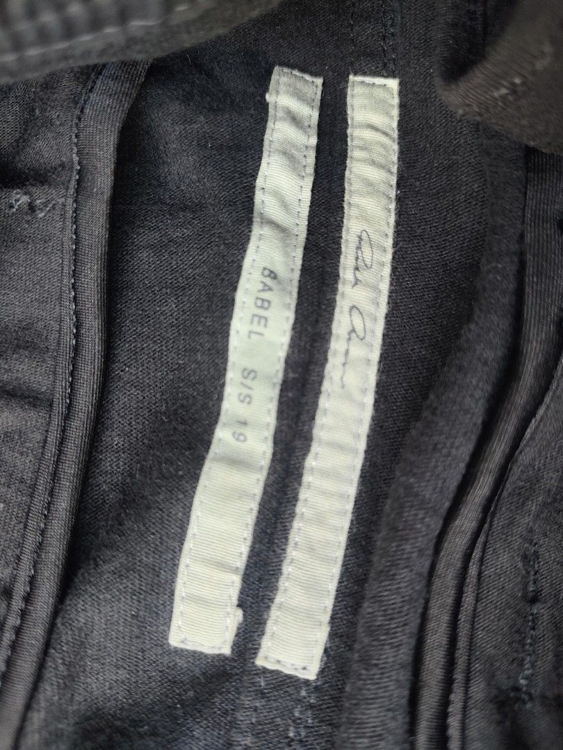 Rick Owens Babel S/S 19 Track Pants (Category: Joggers) located in Manila. Submitted by lux.mnl (Listing ID 1408522432, Image 3). Description: - Rick Owens track pants - Size: S/19 - Color: Black with white side stripes - Features: Drawstring waist, two pockets - Collection: Babel S/S 19 700 plus sf .