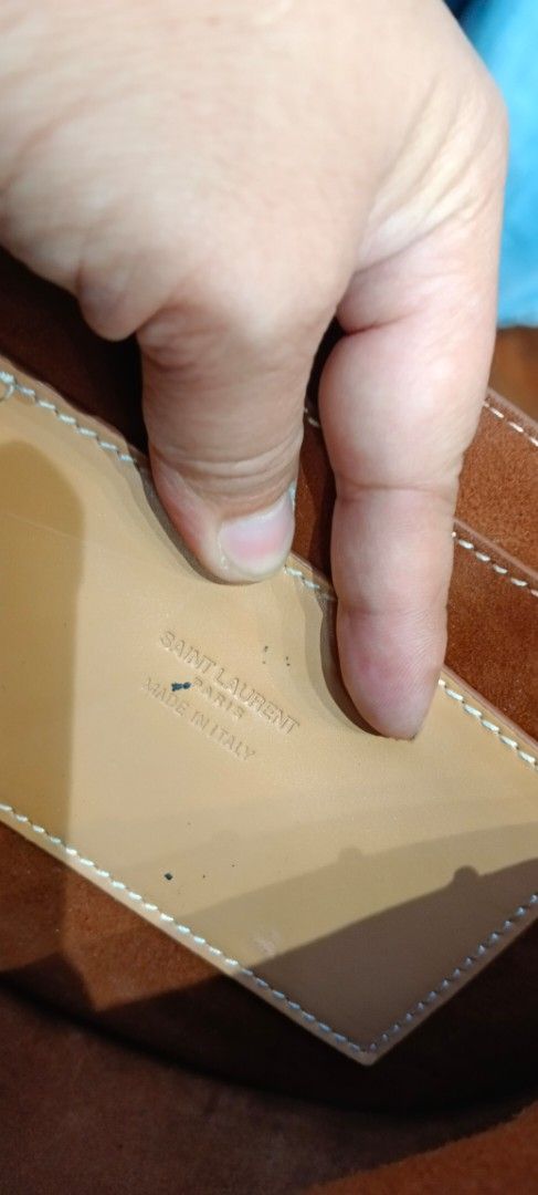 Saint Laurent YSL Crossbody Bag (Category: Luxury Bags & Wallets) located in Legazpi City. Submitted by georgepineda791 (Listing ID 1408502349, Image 3). Description: - Saint Laurent crossbody bag - Color: Light Brown - Iconic YSL logo - Made in Italy - Long strap for shoulder/crossbody wear - Interior: Matching light brown - Condition: Good.