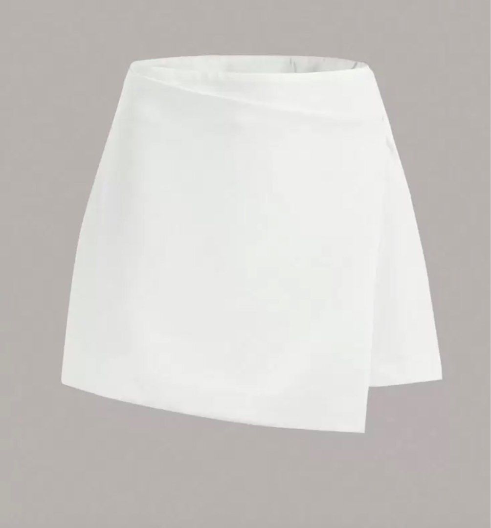 Shein white skort (Category: Skirts) located in Malabon City. Submitted by decluttergyal (Listing ID 1408616988, Image 1). Description: Used once then kept in the closet. Size is XS, can fit ‘til S though you might have to tuck in your tum (that’s what I did)..