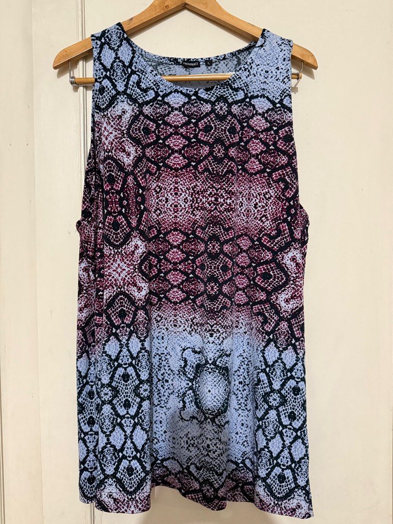 Proudrace Sleeveless Snake Print Top (Category: Sleeveless) located in Manila. Submitted by shopsabrinacloset (Listing ID 1408680965, Image 1). Description: Unisex Snakeskin Print Jersey Can be worn as a dress.