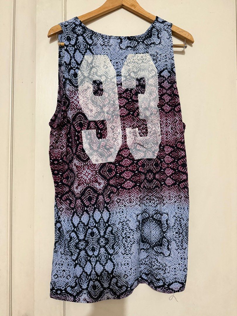 Proudrace Sleeveless Snake Print Top (Category: Sleeveless) located in Manila. Submitted by shopsabrinacloset (Listing ID 1408680965, Image 2). Description: Unisex Snakeskin Print Jersey Can be worn as a dress.