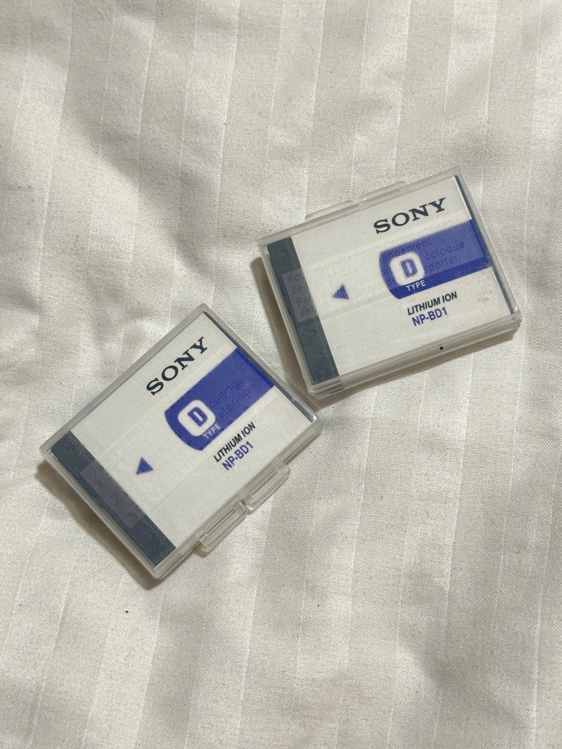 Sony NP-BD1 Lithium Ion Battery Type D (Category: Batteries & Chargers) located in Taguig. Submitted by dentisimo (Listing ID 1408657010, Image 1). Description: - Sony NP-BD1 Lithium Ion Battery - Type D - Original - 300 each, 500 for both.