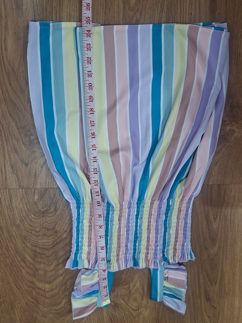 Striped Dress with Ruffle Sleeves (Category: Babies & Kids Fashion) located in Manila. Submitted by kitto222 (Listing ID 1408584023, Image 1). Description: - Colorful striped pattern - Ruffle sleeves - Smocked bodice - Straight skirt - Length: 26 inches - Waist: 13 inches across - Ideal for casual outings.
