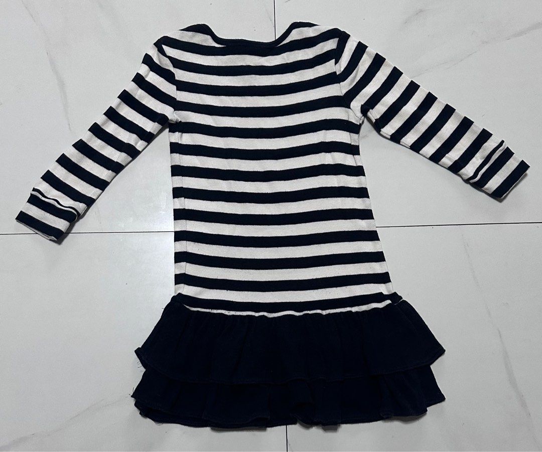 Striped Ruffle Dress (Category: Babies & Kids Fashion) located in Manila. Submitted by chamwel (Listing ID 1408535623, Image 2). Description: Adorable striped dress with long sleeves and a layered ruffle hem. Features a round neckline. The dress is black and white striped on the top and solid black on the bottom. Perfect for a casual day out or a special occasion. See photo for reference..