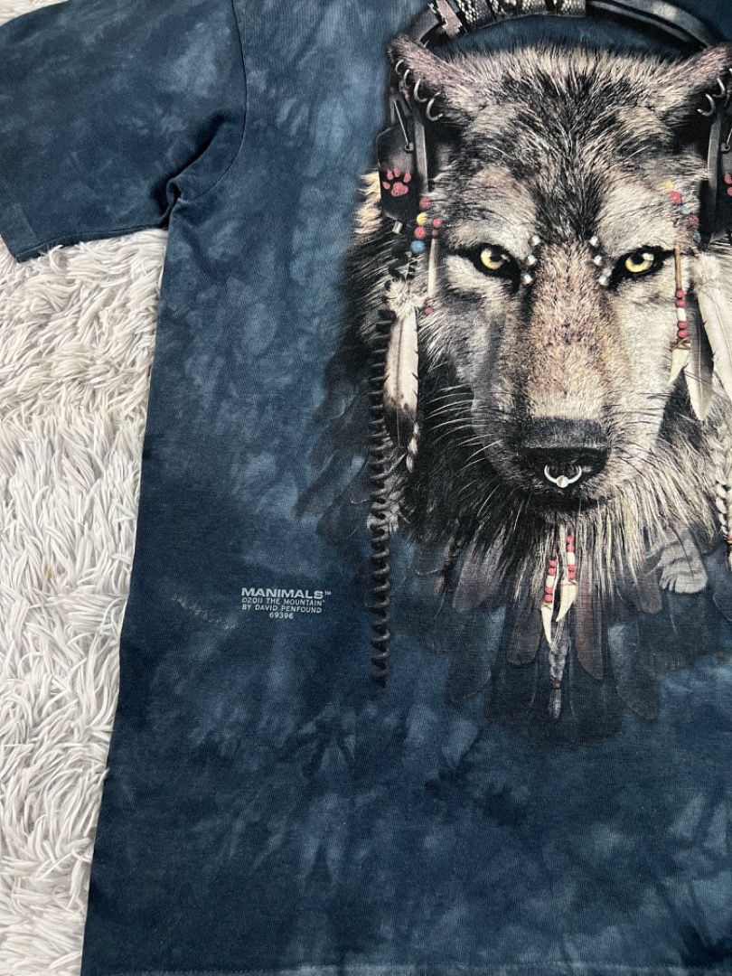The Mountain Wolf T-shirt XL (Category: Tshirts & Polo Shirts ) located in Cebu City. Submitted by kayekallie (Listing ID 1408656345, Image 2). Description: - The Mountain t-shirt with a wolf graphic. - Features a cool tie-dye design. - Comfortable crew neck. - Size: XL - Material: 100% cotton. - Made in the USA. Width 20 Length 28.5.