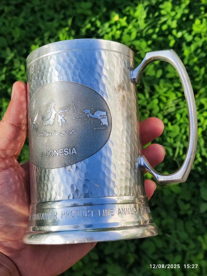 Vintage Indonesian Pewter Mug (Category: Coffee & Tea Tableware) located in Tagum. Submitted by cs1907 (Listing ID 1408570268, Image 1). Description: -with dents, scrat hes and metal dirt. -the looks is still very nice -can be repurposed as pen holder -heavy 620 grams.