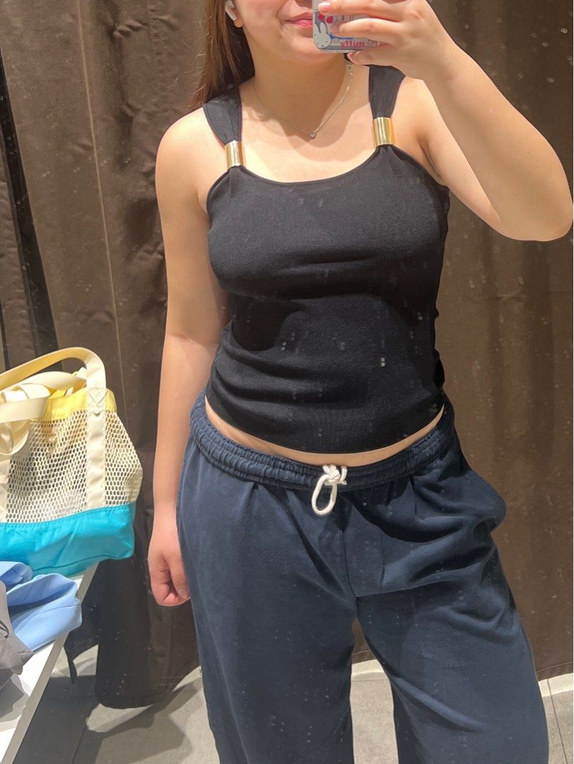 Zara Black Tank Top with Gold Detailing (Category: Sleeveless) located in Pasig City. Submitted by aikagal (Listing ID 1408511021, Image 1). Description: - Black tank top - Thin straps - Simple design - Versatile for various bottoms - Comfortable material - Perfect for everyday wear - Classic wardrobe essential.