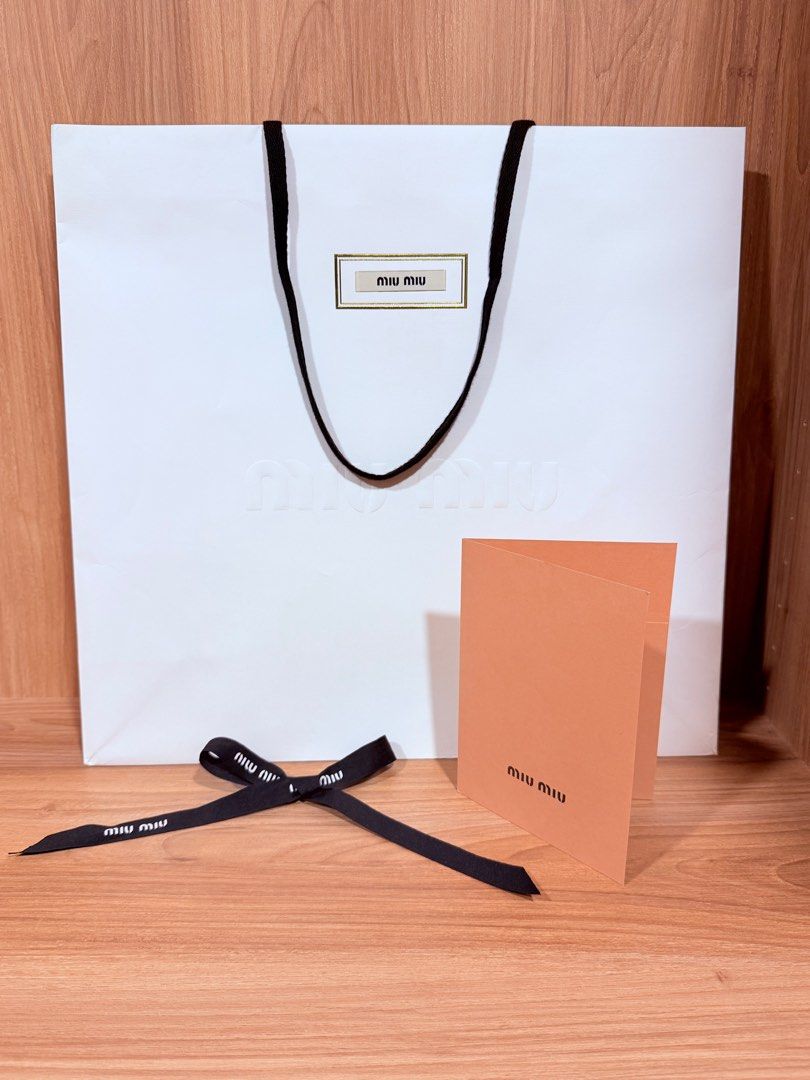 miumiu 紙袋 THE ROW 紙袋 5枚 miumiu 紙袋6枚 ハンガー2本レシート