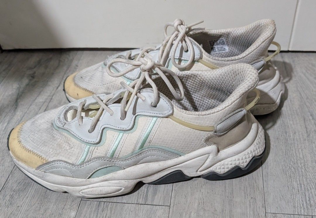 Adidas Ozweego White Sneakers (Category: Sneakers) located in Quezon City. Submitted by jerry.rc (Listing ID 1408797819, Image 2). Description: - Adidas Ozweego sneakers - Size: US 9 - Worn less than 15x - needs some cleaning lang - bought in Dubai - Sadly, I don't have the box anymore.