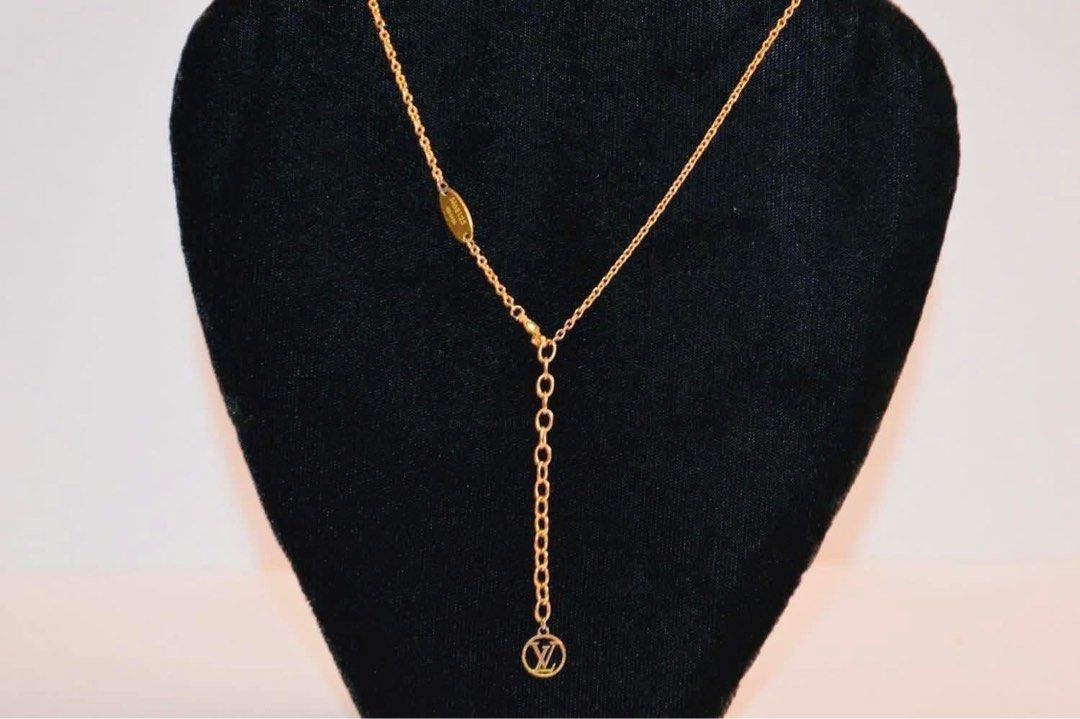 Authentic Louis Vuitton (Category: Luxury Accessories) located in Manila. Submitted by chloe_luxuries (Listing ID 1408832937, Image 2). Description: Guaranteed Original Louis Vuitton In Gold tone Chain link necklace Still in very good condition Comes with pouch and box Pm for those interested .