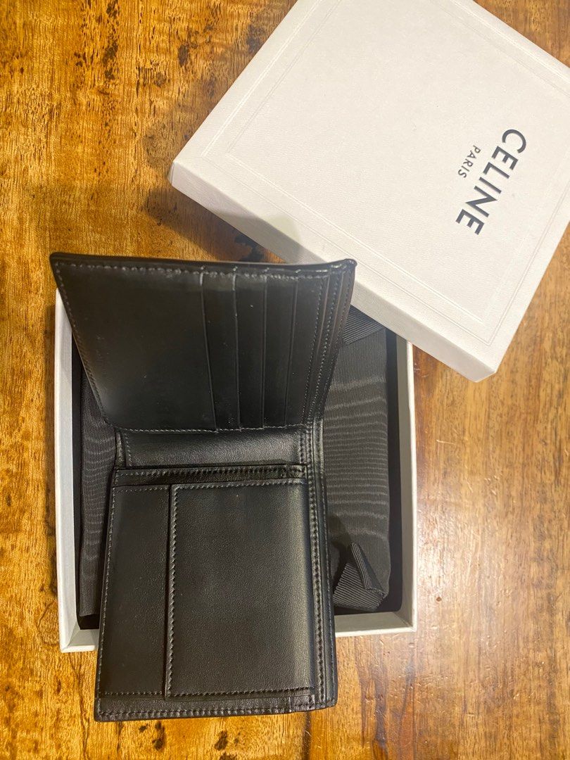 Celine Triomphe Bi-Fold Wallet (Category: Luxury Bags & Wallets) located in Manila. Submitted by rockyd.ocean (Listing ID 1408706694, Image 2). Description: Celine Bi-fold wallet Triomphe Canvas Includes: Dust Bag Box Description: Brand new 18k.