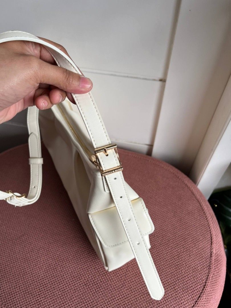 Charles & Keith Khai Side-Pocket Shoulder Bag (Category: Carriers & Slings) located in Candelaria. Submitted by pinkykeenshop (Listing ID 1408780255, Image 3). Description: .