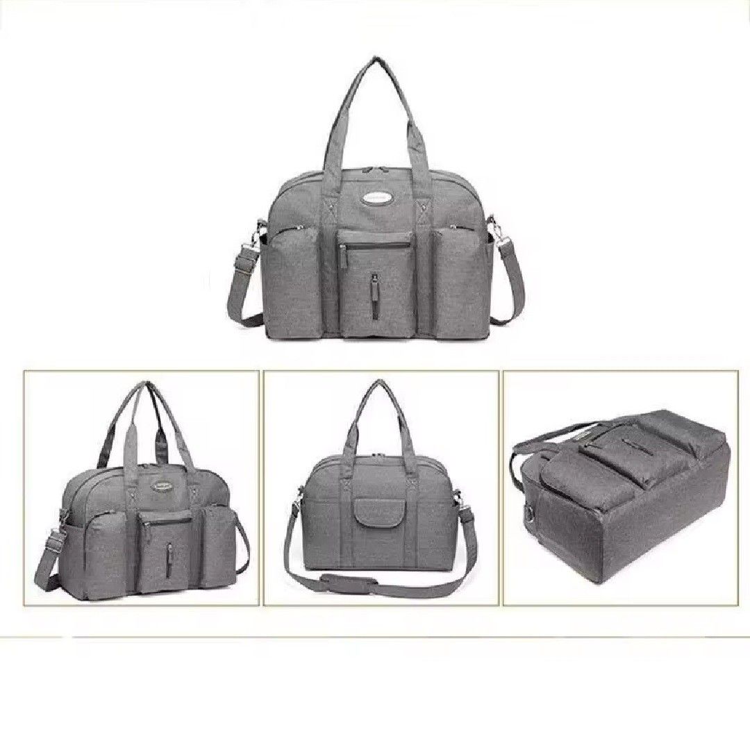 Colorland Diaper Bag - Grey (Category: Diaper Bags & Wetbags) located in Pasig City. Submitted by apscloset (Listing ID 1408804021, Image 2). Description: Preloved diaper bag... Still in great condition... Price negotiable for serious buyers... Stylish and spacious Colorland diaper bag. Features multiple pockets: 1 main bag, 3 front pockets, 2 side pockets, and 1 back pocket. Includes a shoulder strap, wet bag, and change pad. The adjustable shou