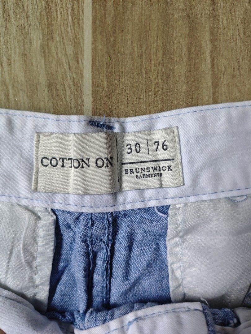 Cotton On Blue Shorts Size 30 (Category: Shorts) located in Villareal. Submitted by Whel08 (Listing ID 1408719981, Image 2). Description: - Cotton On blue shorts - Size 30 - Button closure - Pockets - Light blue color - Inseam: 16 inches - Brand: Brunswick Garments.