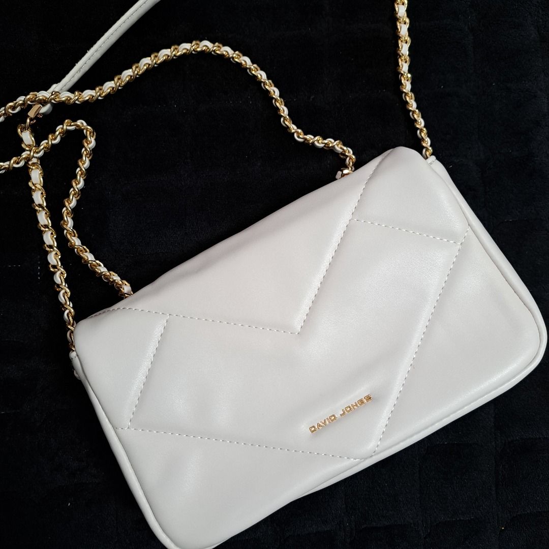 David Jones Paris two-way bag (Category: Shoulder Bags) located in Tarlac. Submitted by allisonaton (Listing ID 1408720206, Image 3). Description: Preloved David Jones Paris shoulder/ crossbody bag in creamy white Material: PU leather In good condition DIMENSION:8.6"(L)x2.7" (W)x5.1" (H) 22*7*13CM Rfs: decluttering😊 MOP: Gcash.
