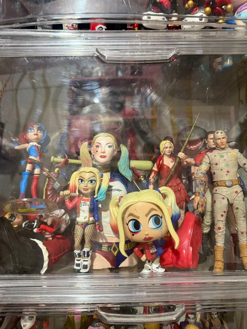 DC Comics Joker and Harley Quinn Figures (Category: Figurines & Statues) located in Manila. Submitted by ms.mr.00 (Listing ID 1408828903, Image 2). Description: - DC Comics Joker & Harley Quinn action figure collection. - Features multiple Joker figures in different styles. - Includes various Harley Quinn figures. - Some figures are Funko Pop! vinyls. - Diverse sizes and designs. - Perfect for DC Comics enthusiasts..