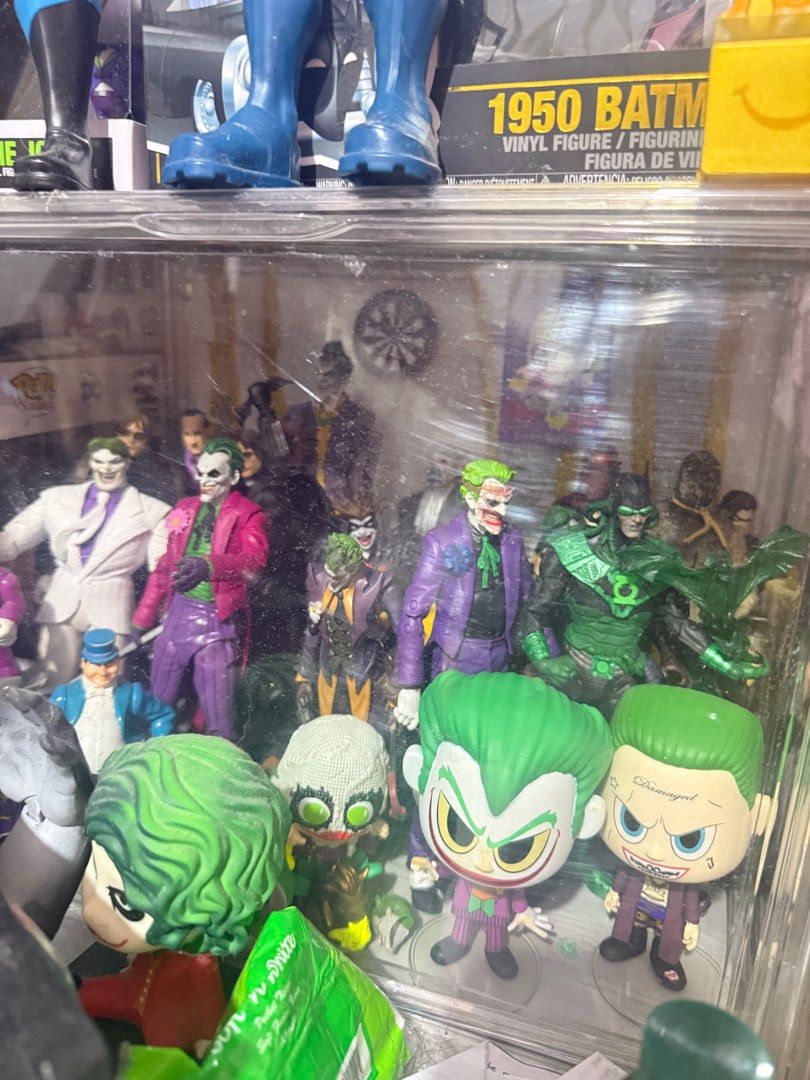 DC Comics Joker and Harley Quinn Figures (Category: Figurines & Statues) located in Manila. Submitted by ms.mr.00 (Listing ID 1408828903, Image 1). Description: - DC Comics Joker & Harley Quinn action figure collection. - Features multiple Joker figures in different styles. - Includes various Harley Quinn figures. - Some figures are Funko Pop! vinyls. - Diverse sizes and designs. - Perfect for DC Comics enthusiasts..