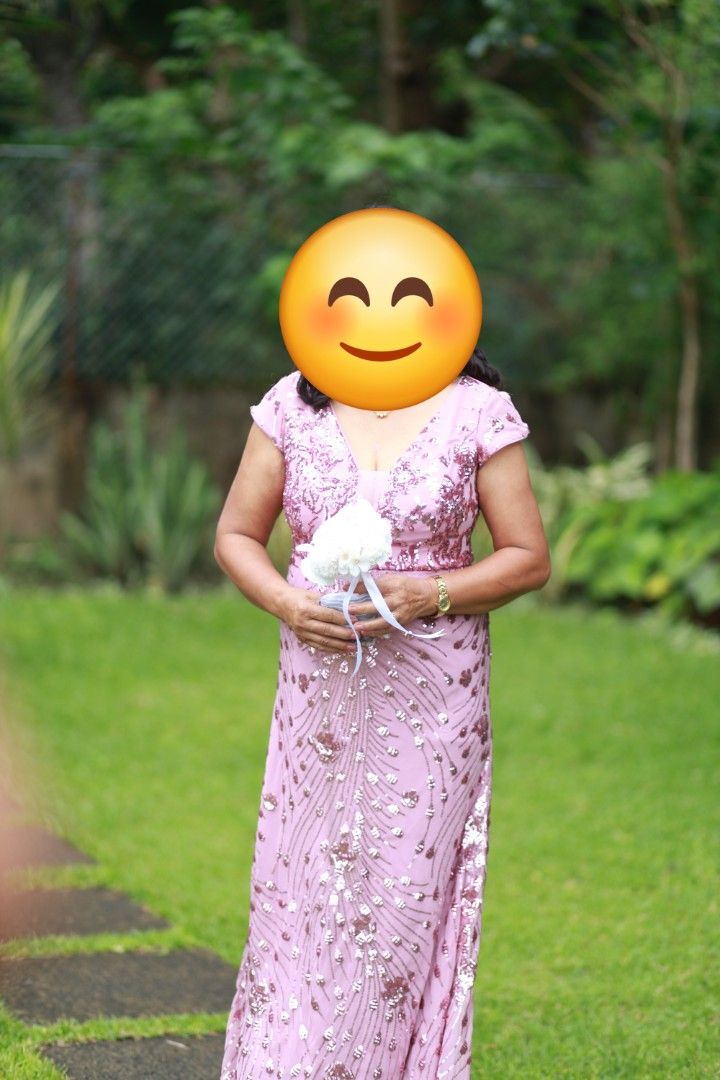 Dusty Rose Long Gown V-Neck (Category: Dresses) located in Marikina City. Submitted by everbloom28 (Listing ID 1408834527, Image 2). Description: Pink Long Gown For Sale - Dusty rose floor-length gown - Features a V-neckline - Adorned with sequins - Flattering silhouette - Used only once for wedding mother of the bride. Size: XL Price: 1700 Sagot po ng customer ang Sf. Marikina free delivery..
