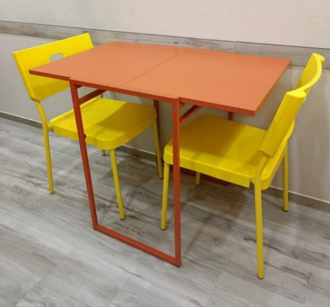 Extendable Table (Category: Tables & Sets) located in Singapore. Submitted by cosmicproqi (Listing ID 1408754110, Image 3). Description: - Stylish extendable table - Perfect for small spaces, extendable to seat 2 pax - Dimensions: 92cm x 60cm x 74cm (fully extended) - White colour available, only 1 set of orange -$8 per unit, multiple units available.