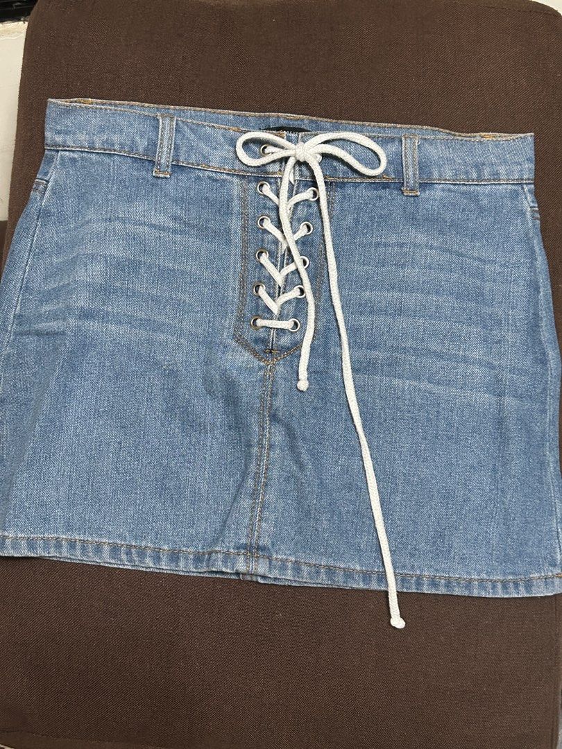 Forever 21 Denim Lace-Up Skirt (Category: Skirts) located in Mandaluyong City. Submitted by berrycherryy (Listing ID 1408751608, Image 2). Description: Forever 21 Denim Skirt P220 - Size: Large - Lace-up front detail - Light blue wash MOP: GCash/GoTyme/BPI MOD: Lalamove/J&T/LBC Location: Mandaluyong City.