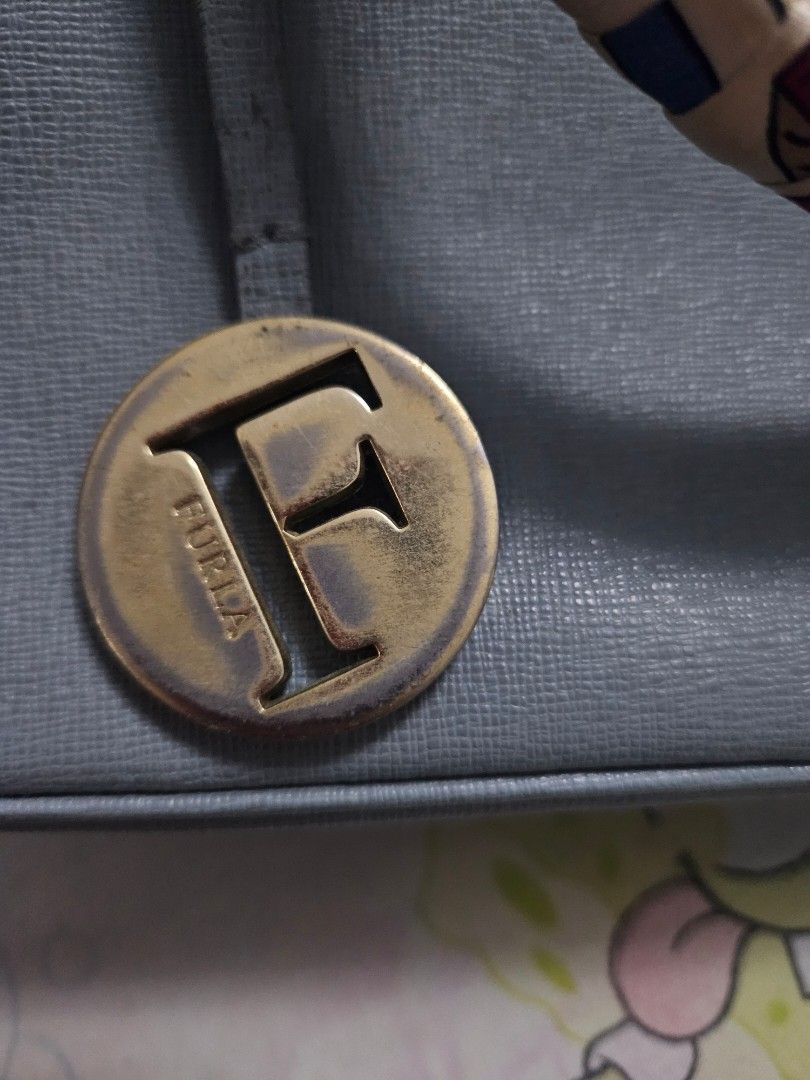 Furla bag/ hand bag (Category: Cross-body Bags) located in General Mariano Alvarez. Submitted by eiprilfa (Listing ID 1408822415, Image 2). Description: furla bag. nsa picture n po issue..