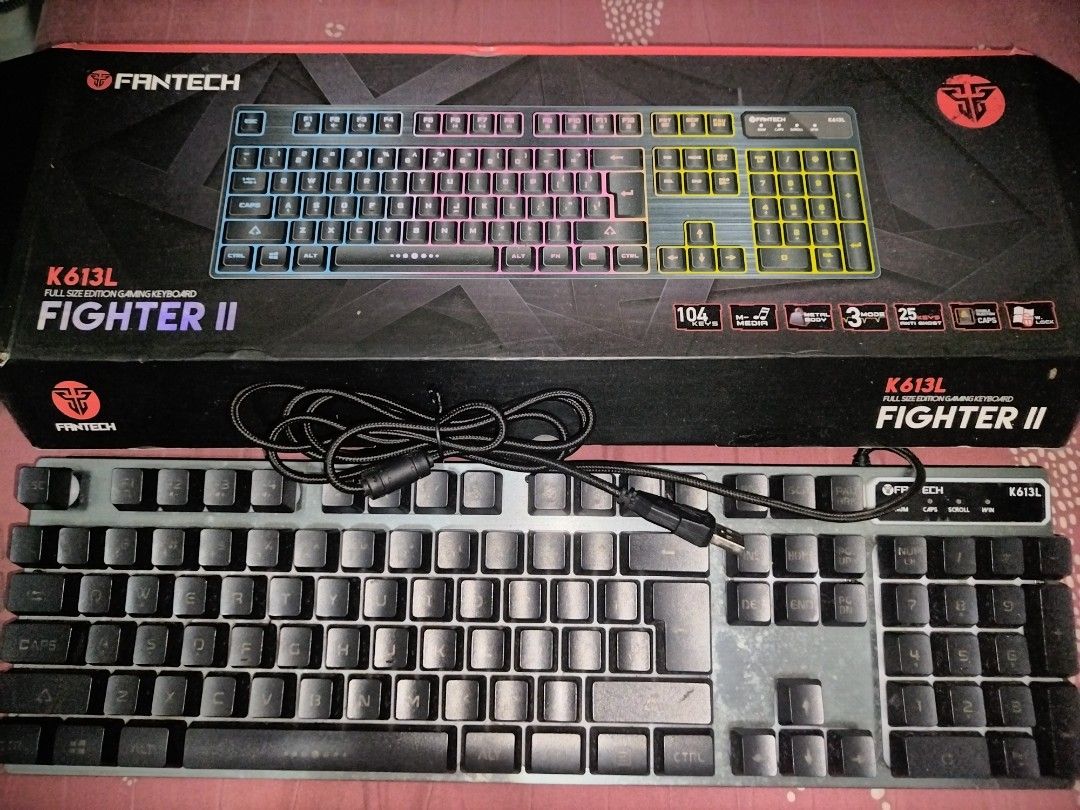 Gaming Keyboard (Category: Computer Keyboard) located in Manila. Submitted by nittygritty2 (Listing ID 1408873628, Image 2). Description: Fantech K613L Fighter II full-size gaming keyboard with 104 keys. Features backlight floating keys and multimedia functions. Includes a nylon copper cable. The keyboard has a USB interface and supports Windows XP/7/8/10 and MAC OS. Comes with the original box. -No issue -Last price.